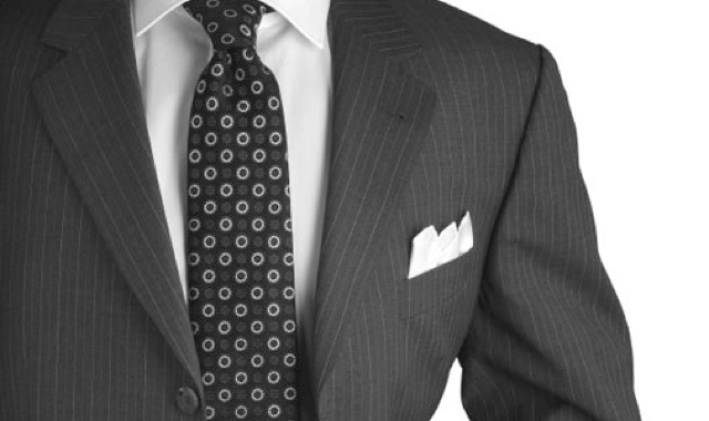 A man's jacket, shirt and tie